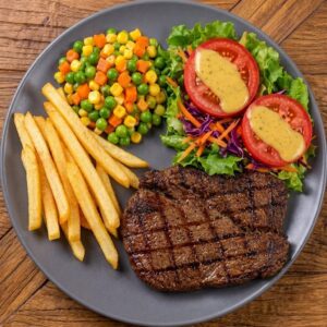 Lomo papas fritas y ensalada